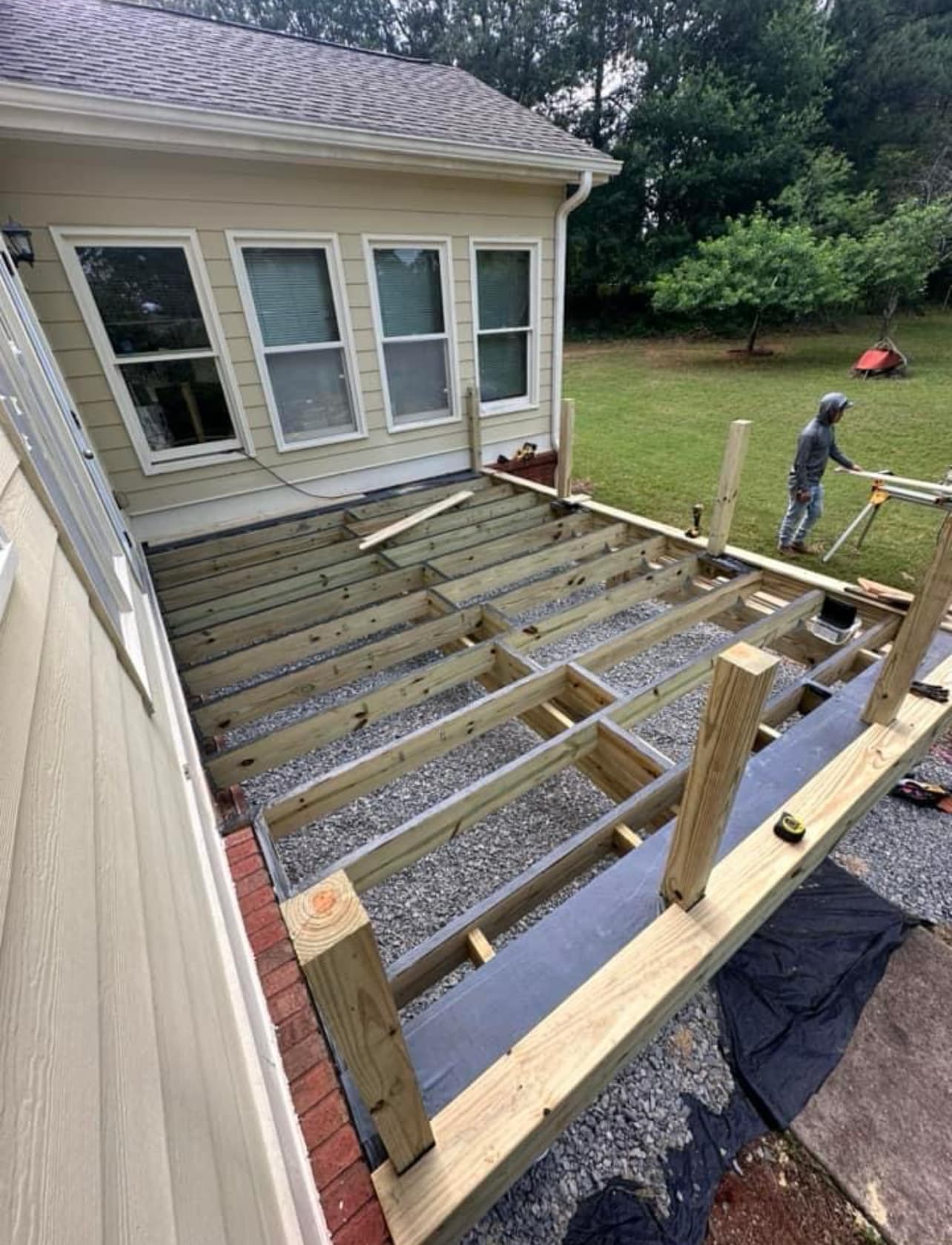 Deck construction with crew on site