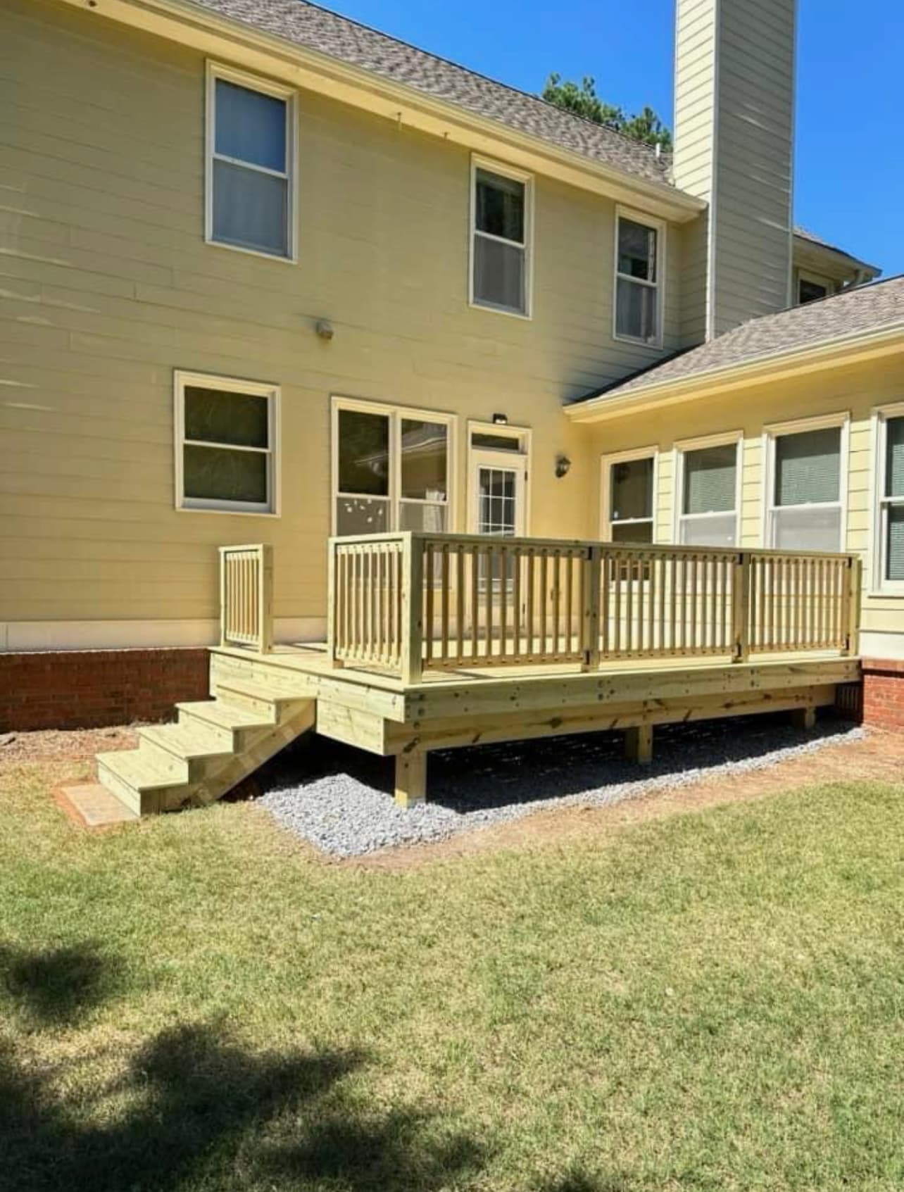 Finished deck with railings and steps