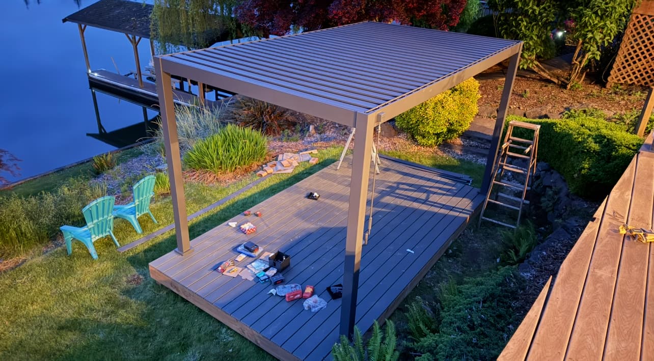 Custom pergola over composite deck with waterfront view