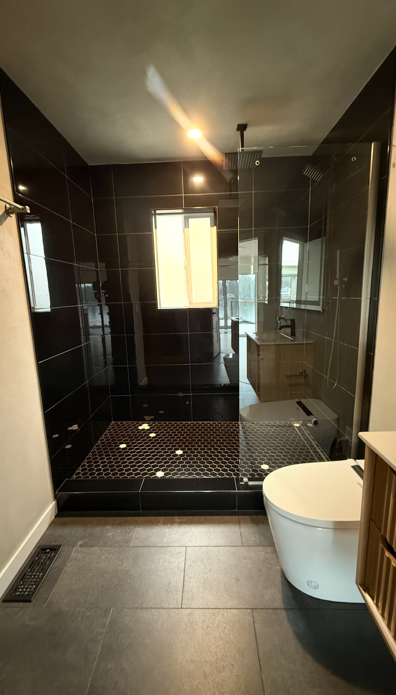 High-end bathroom remodel by Evergreen Building Group LLC